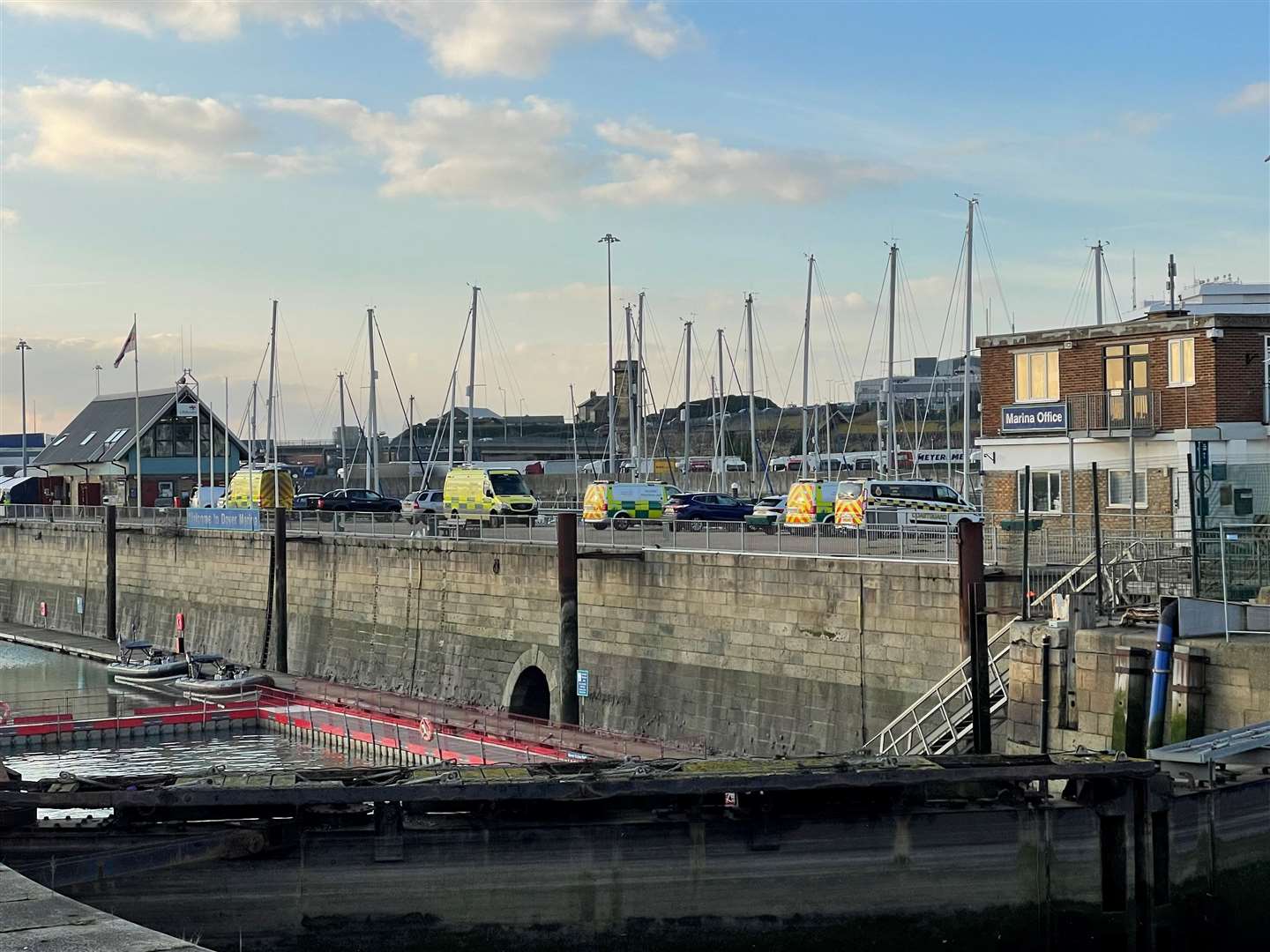 Emergency services at Dover after a small boat capsized in the English Channel last year