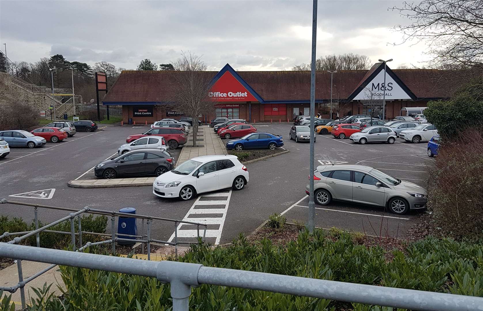 The former Office Outlet unit - which was previously a Staples store - sits next to an M&S Foodhall