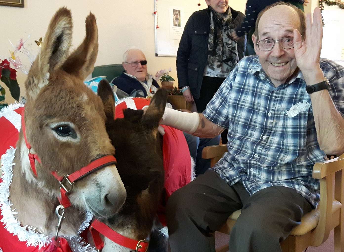 Arthur Grimes, 87, waves for the camera