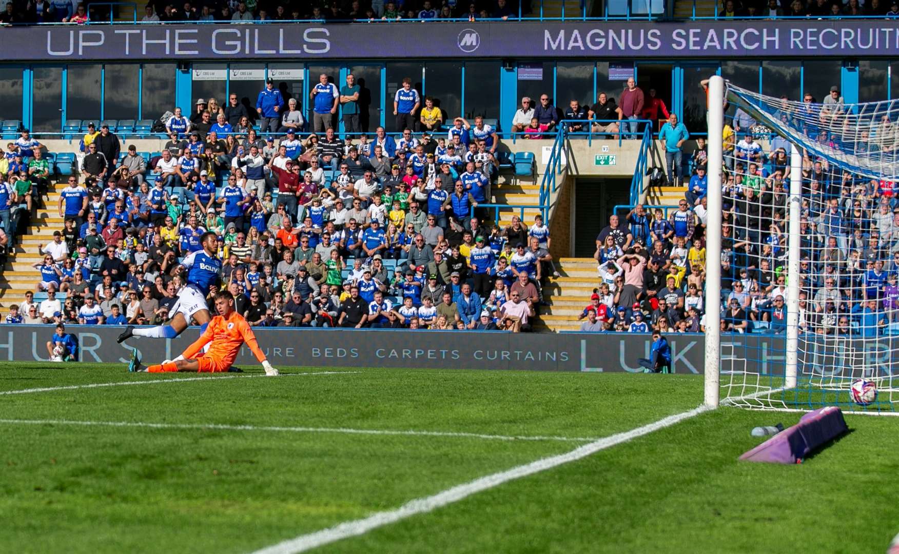 Jayden Clarke scores the opener for Gillingham against Barrow Picture: @Julian_KPI