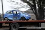 Mrs Chastney's damaged car is removed from the crash scene