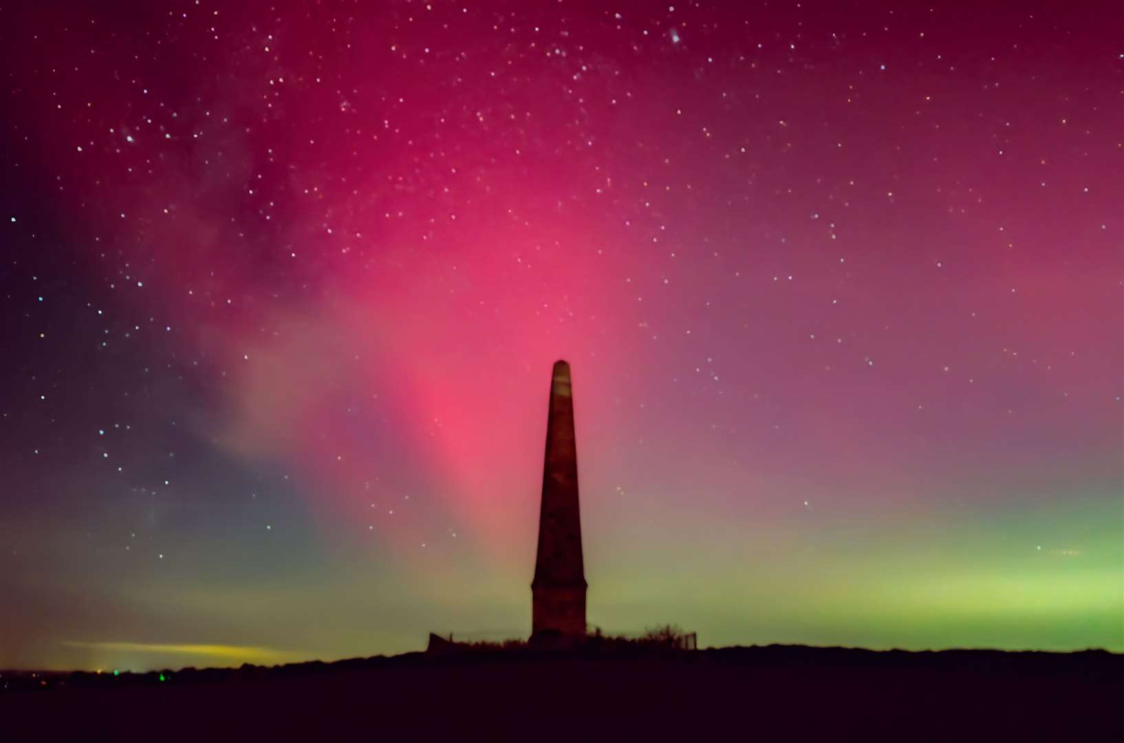 The Cosway Memorial in Bilsington, near Ashford, and the stunning Northern Lights on Thursday night. Picture: Pablo Cayuela