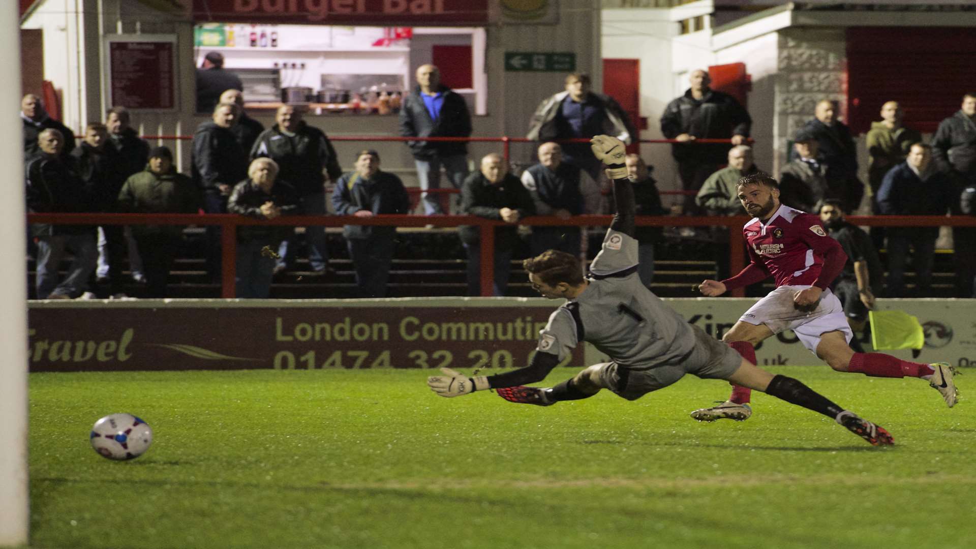 Matty Godden beats Farnborough keeper Charlie Grainger to make it 2-0 Picture: Andy Payton