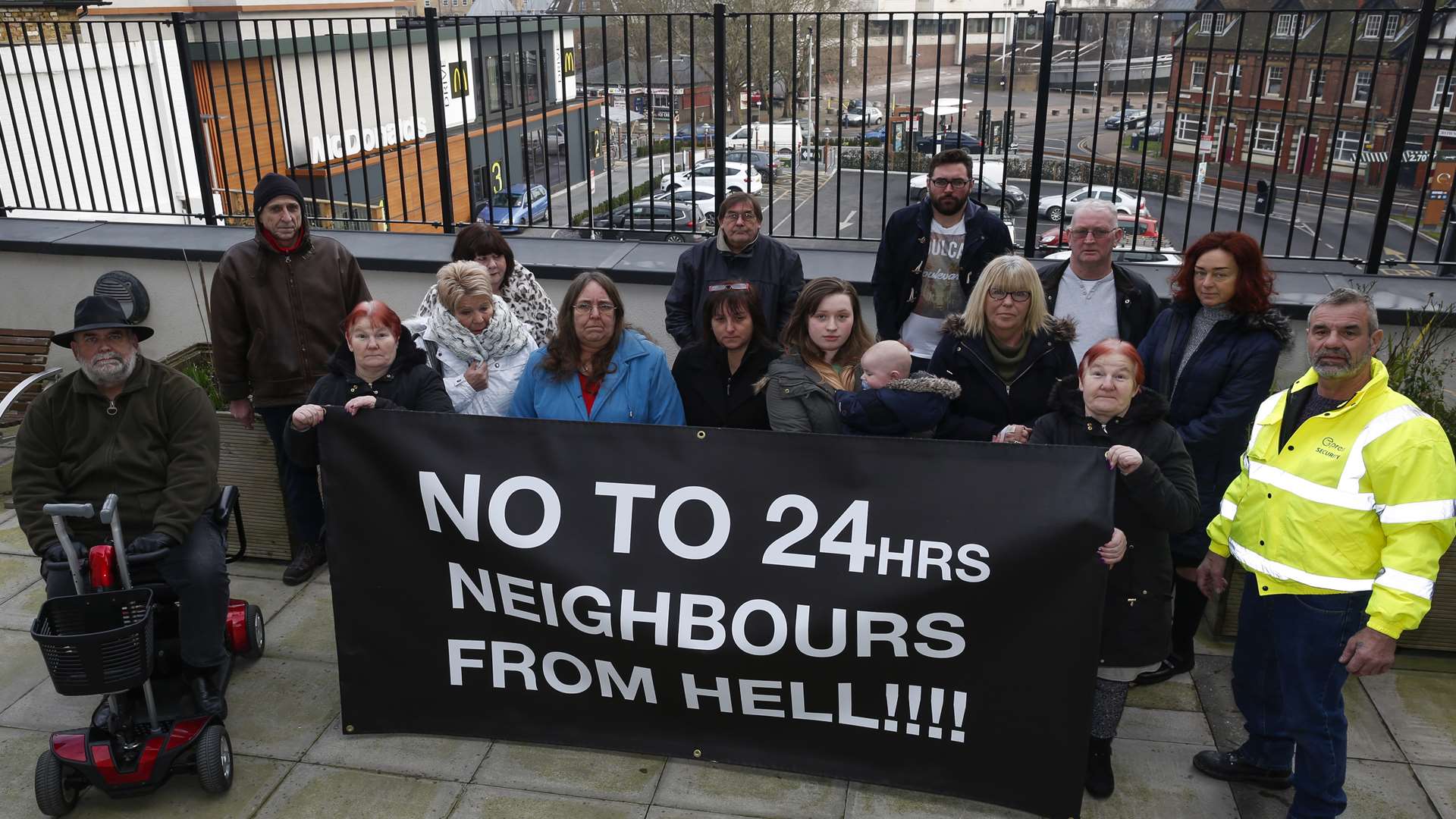 Residents of Broadway Heights made this banner when the restaurant first applied to be open 24 hours a day and are displaying it again