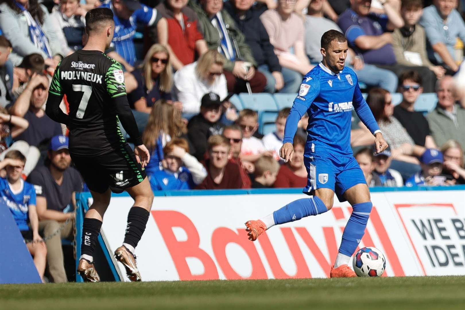 Cheye Alexander in possession for Gillingham against Doncaster