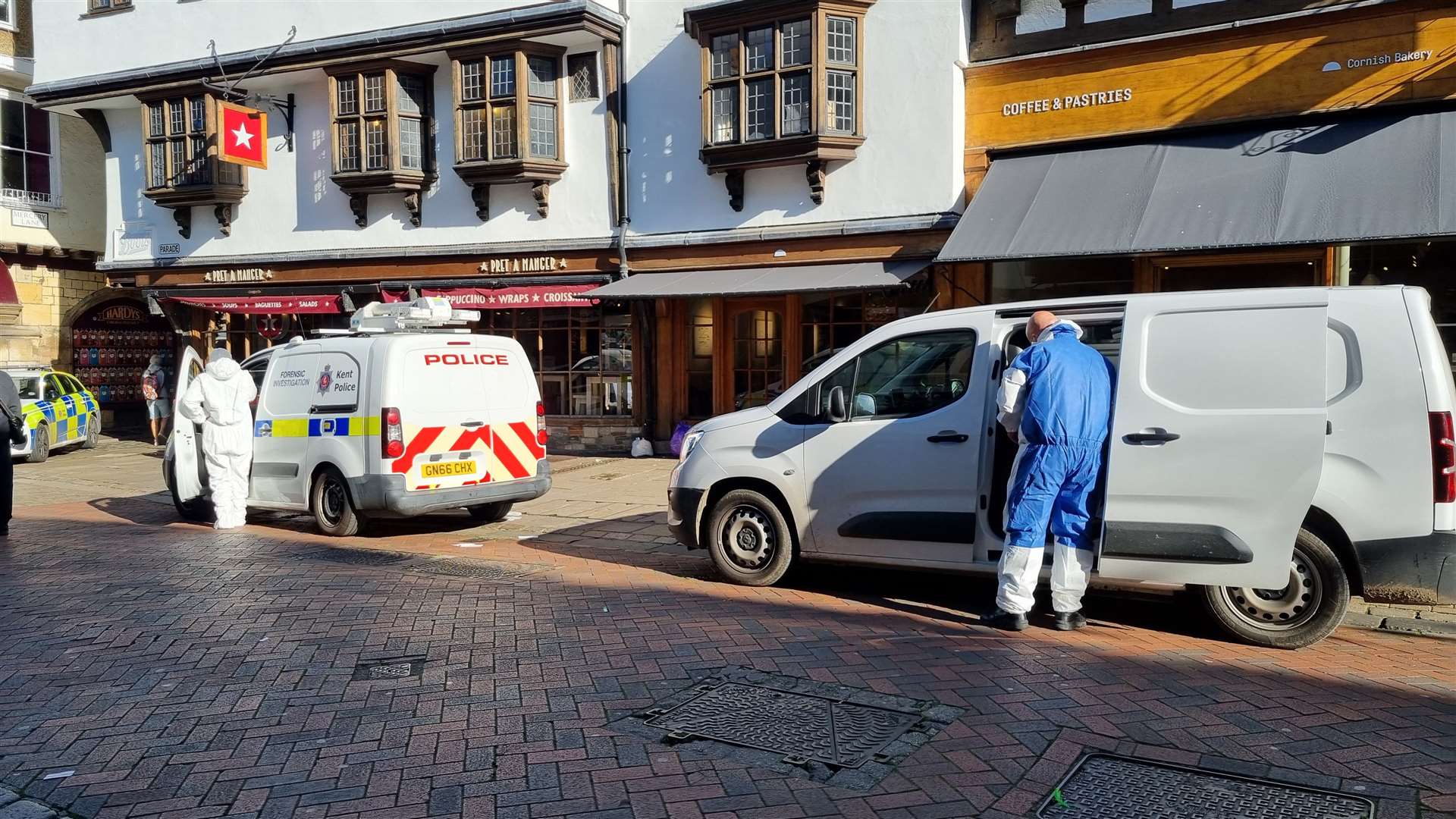 Forensics working in Canterbury High Street after a murder probe was launched