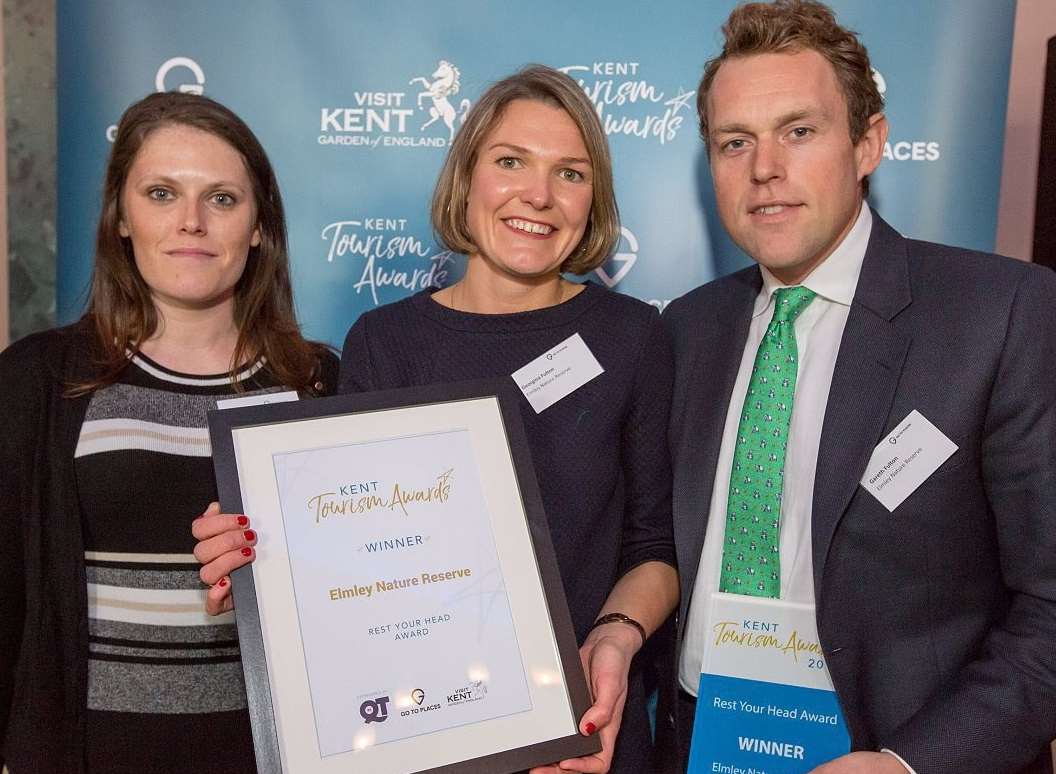 Stephanie Currie from Quality in Tourism, left, presents the award to Georgina and Gareth Fulton of Elmley Nature Reserve