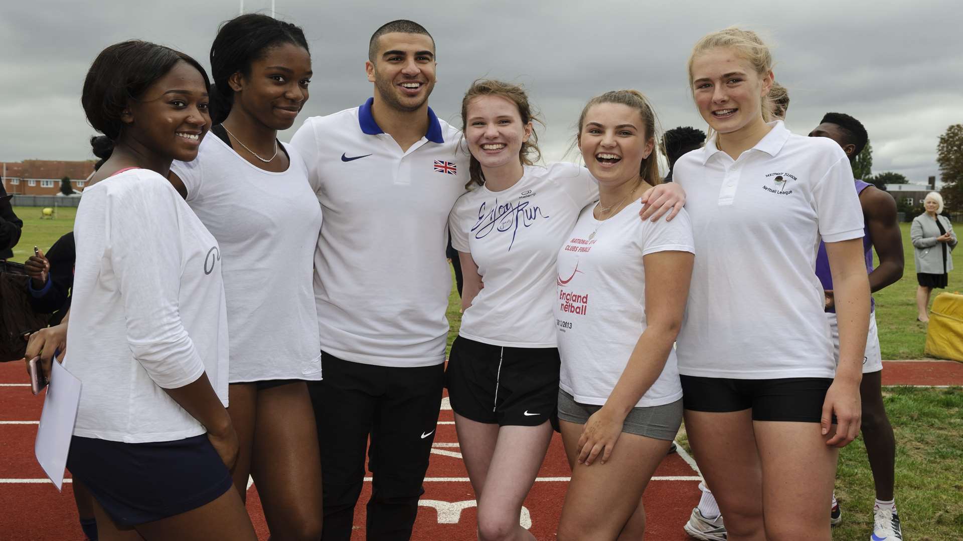 Adam Gemili with sixth form girl runners