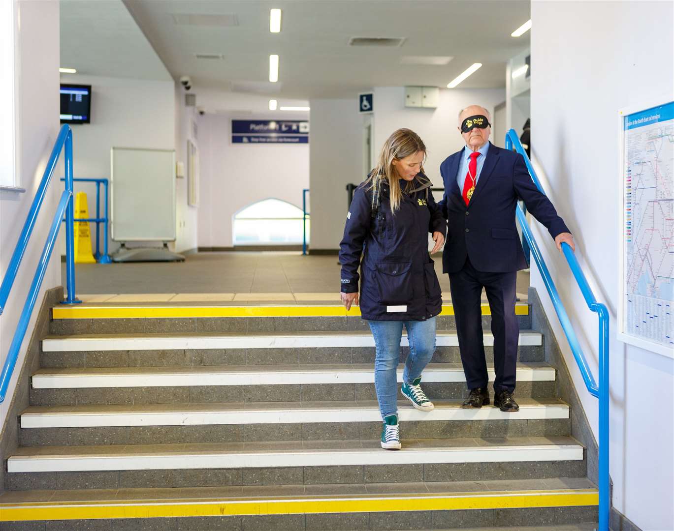 The mayor makes his way gingerly down the station steps