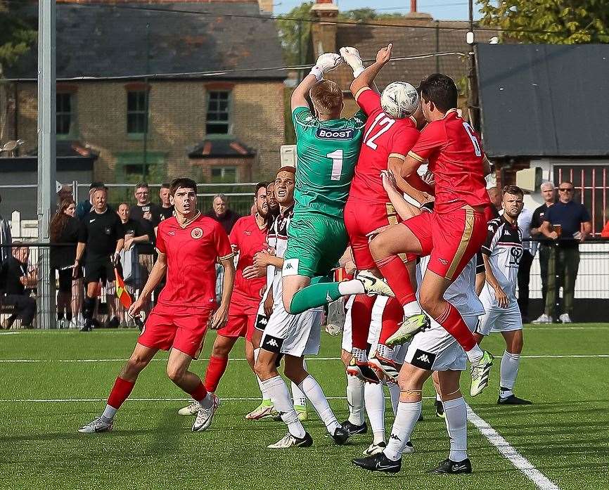 Faversham keeper Jacob Russell comes under pressure against Whitstable. Picture: Les Biggs