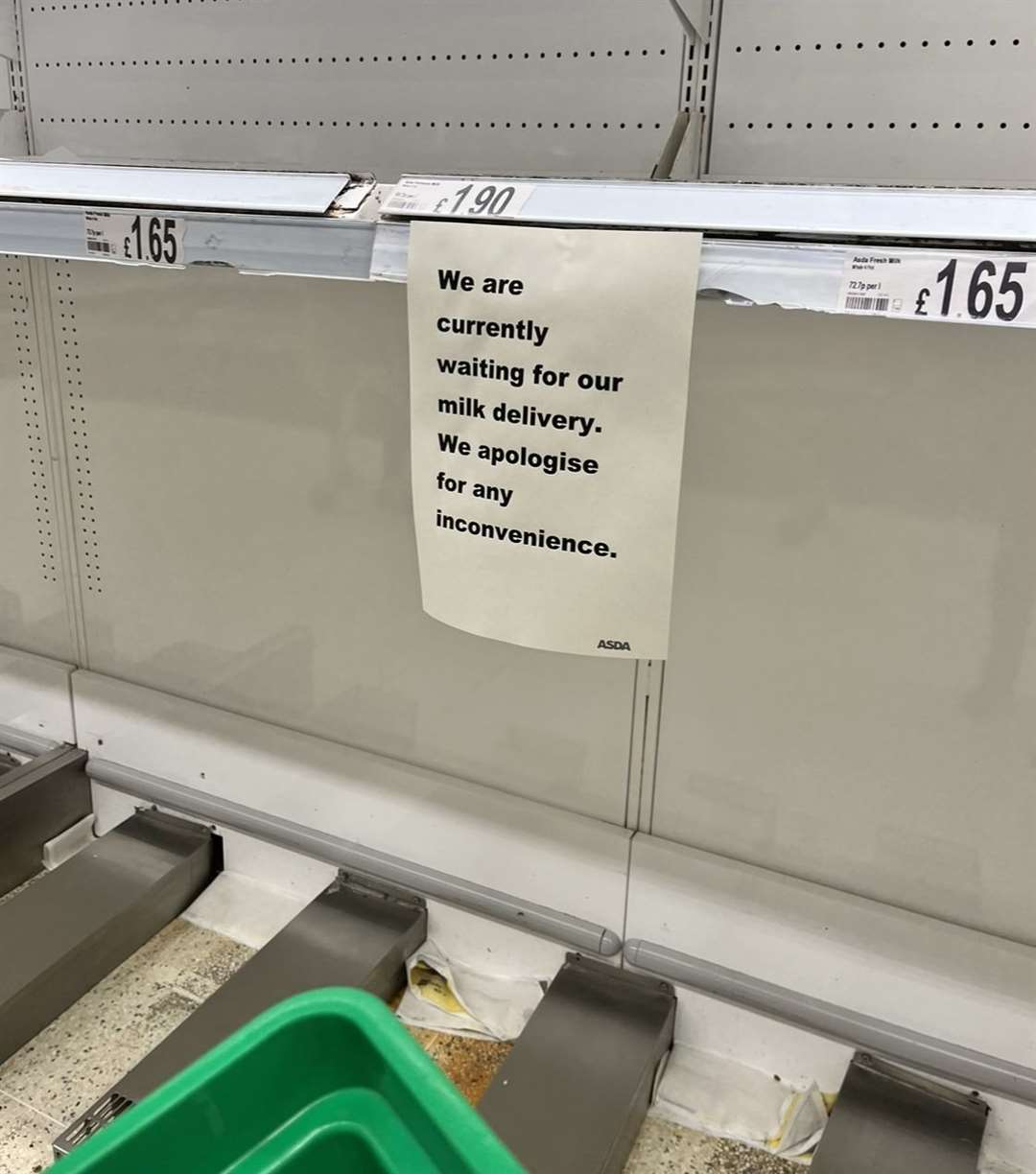 Empty milk shelves at Asda in Greenhithe