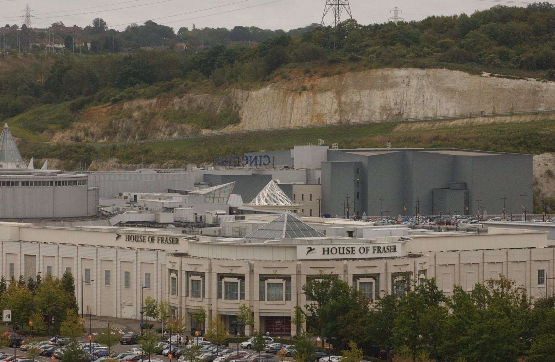 The sheer sides of the former quarry surround Bluewater today