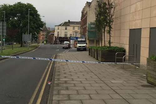 Police tape cordons off the Asda car park