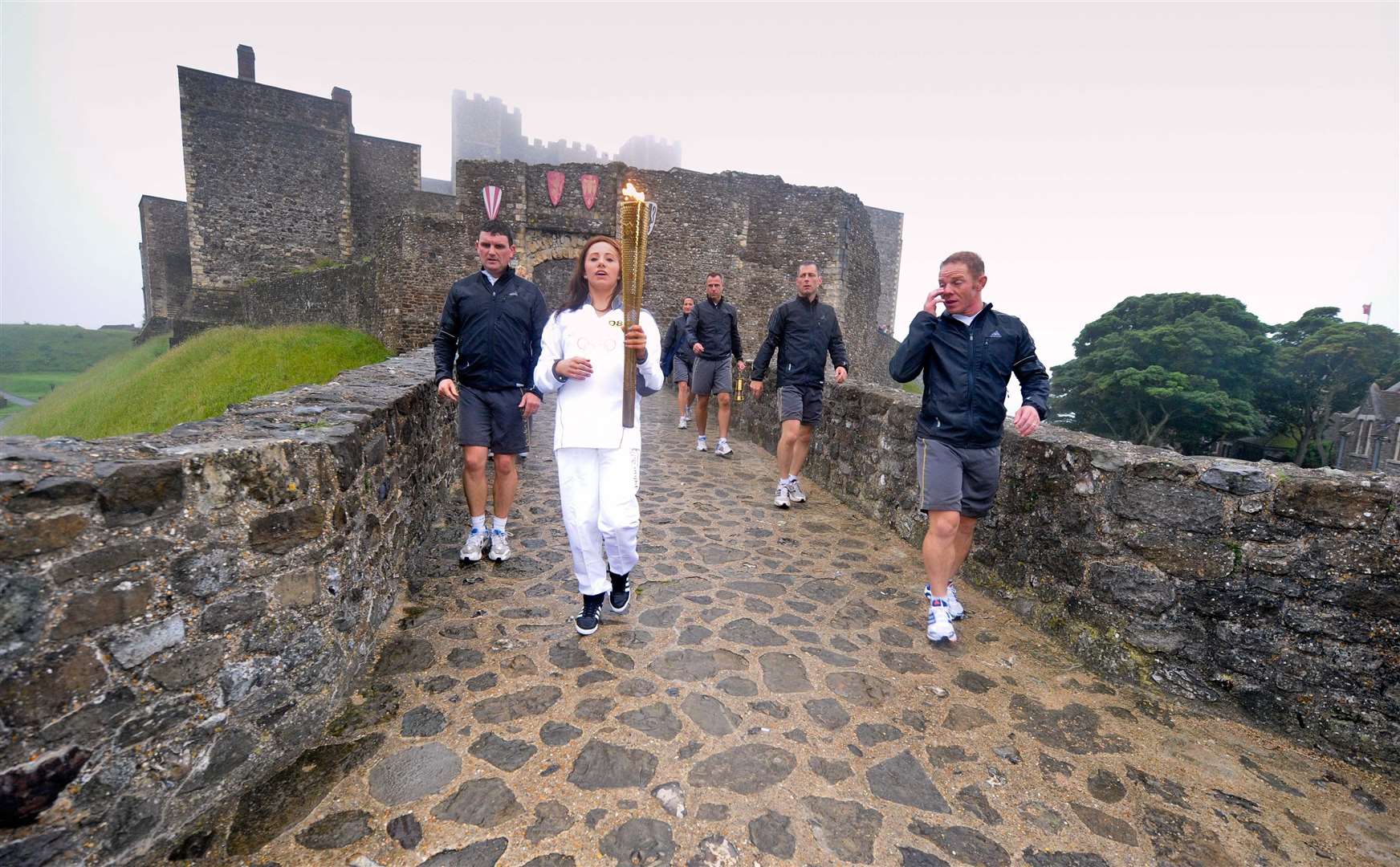 The flame heading out from Dover Castle towards the town below