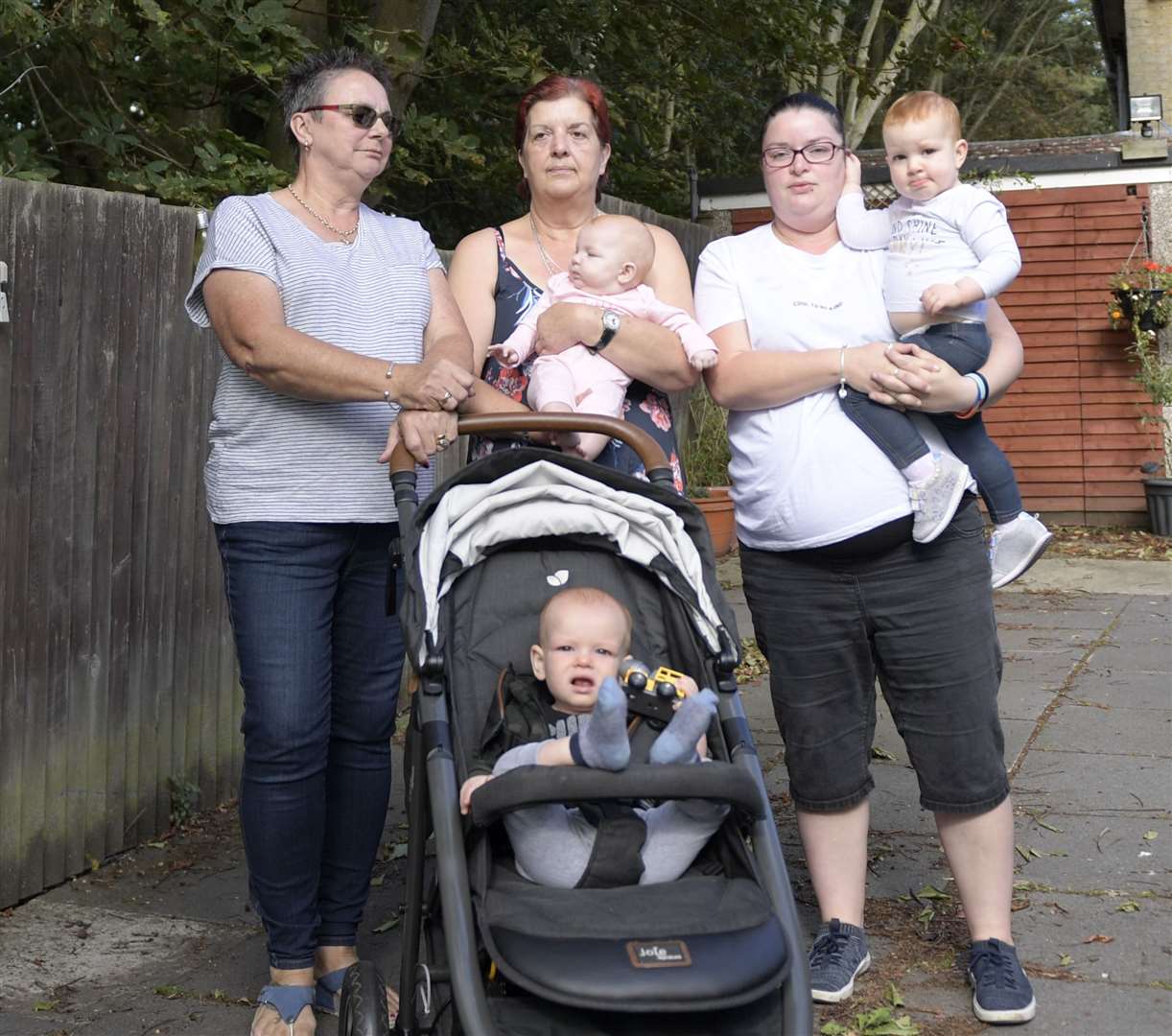 From left: Marilyn Kemsley, Mrs Jayne Lay and Miss Amanda Lay are among those who are calling for the trees to be reduced in height