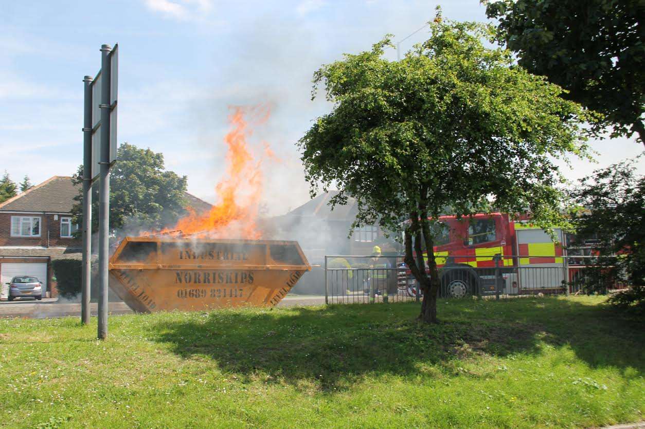 An eyewitness praised the driver for working to quickly remove the skip from the vehicle. Pic: Keith Ingrams.