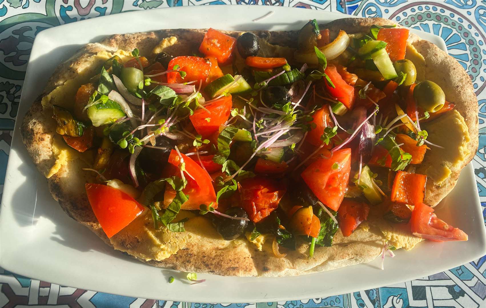 My Mediterranean Plate was a large flatbread covered with houmous, roasted vegetables, salad and sauce - all for under £10