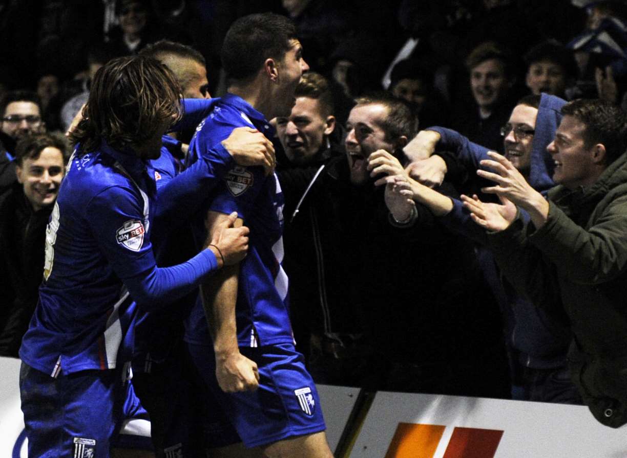 Gillingham celebrate John Egan's 79th-minute winner on Saturday. Picture: Barry Goodwin