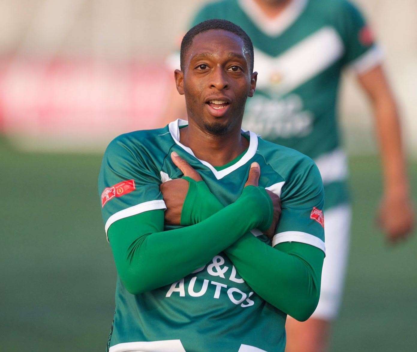 Ashford midfielder Lanre Azeez celebrates his goal against Haywards Heath. Picture: Ian Scammell