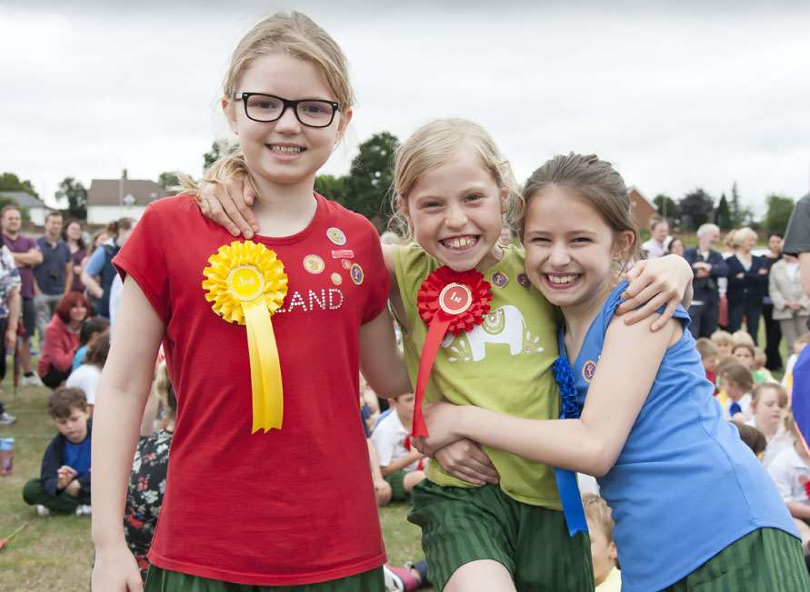 Children celebrate their achievements. Picture: Scott Wishart