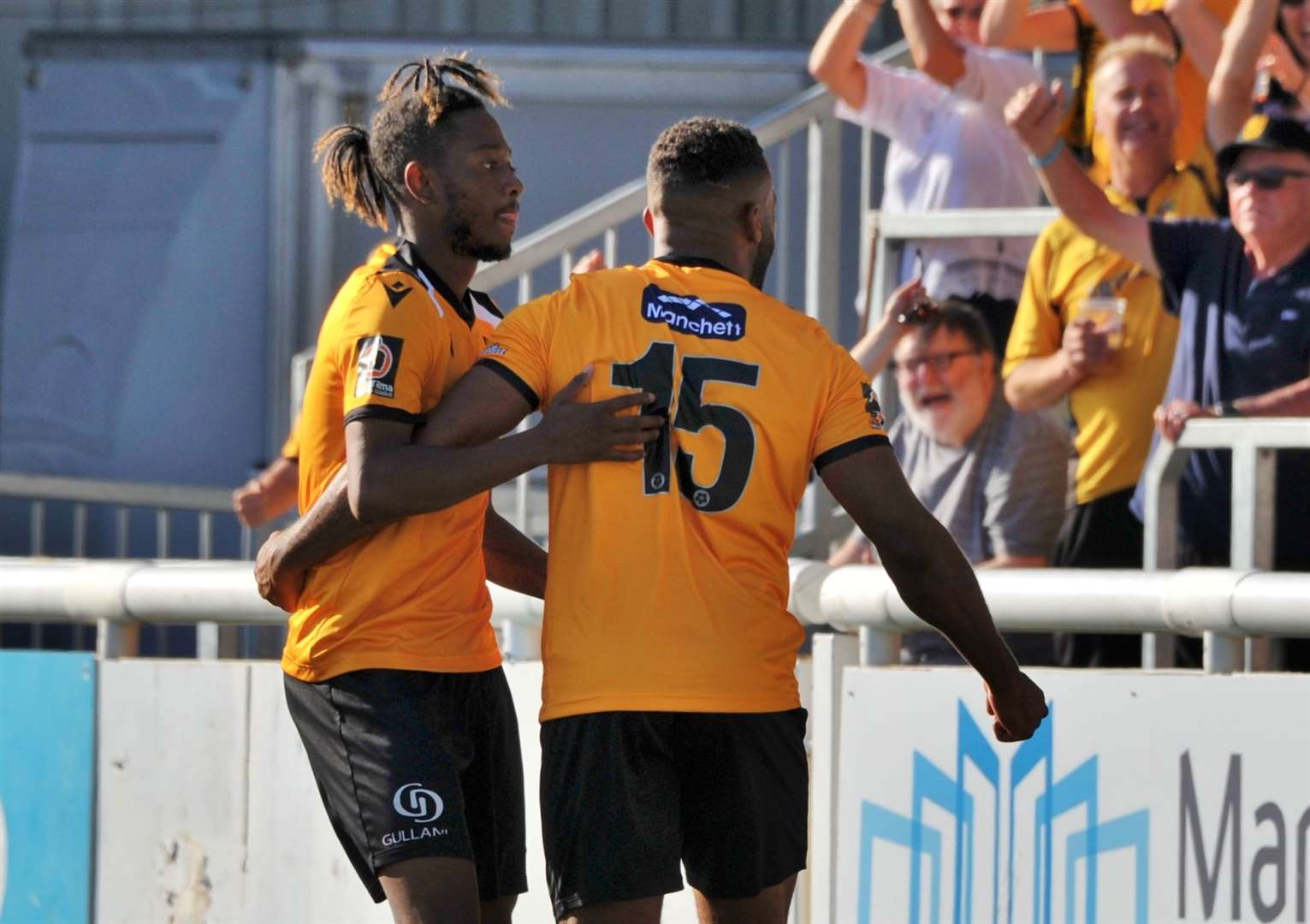 Iffy Allen, left, celebrates his goal with Dan Wishart Picture: Steve Terrell