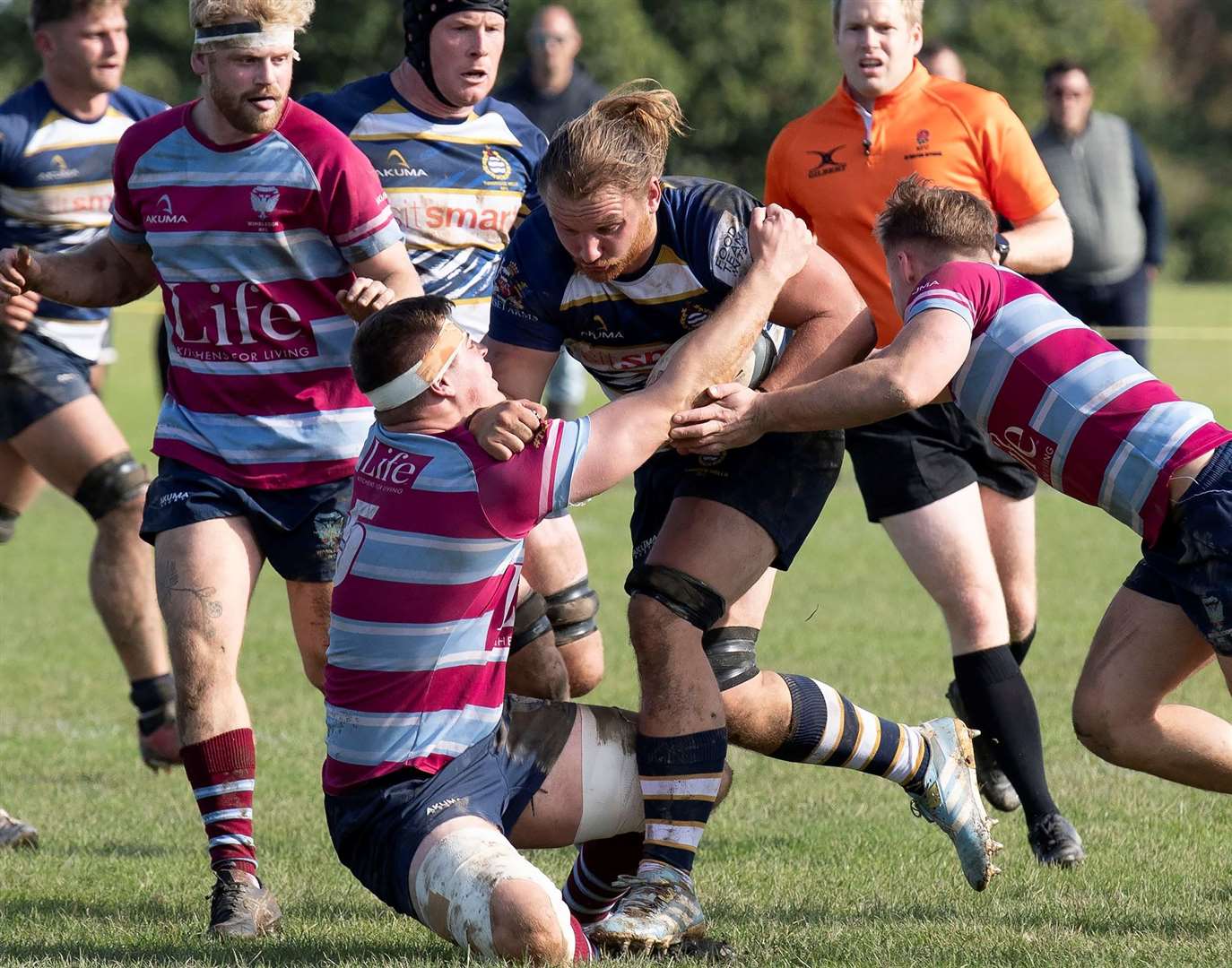 Tunbridge Wells' Ben Whale powers his way forward against Wimbledon. Picture: Bruce Elliott