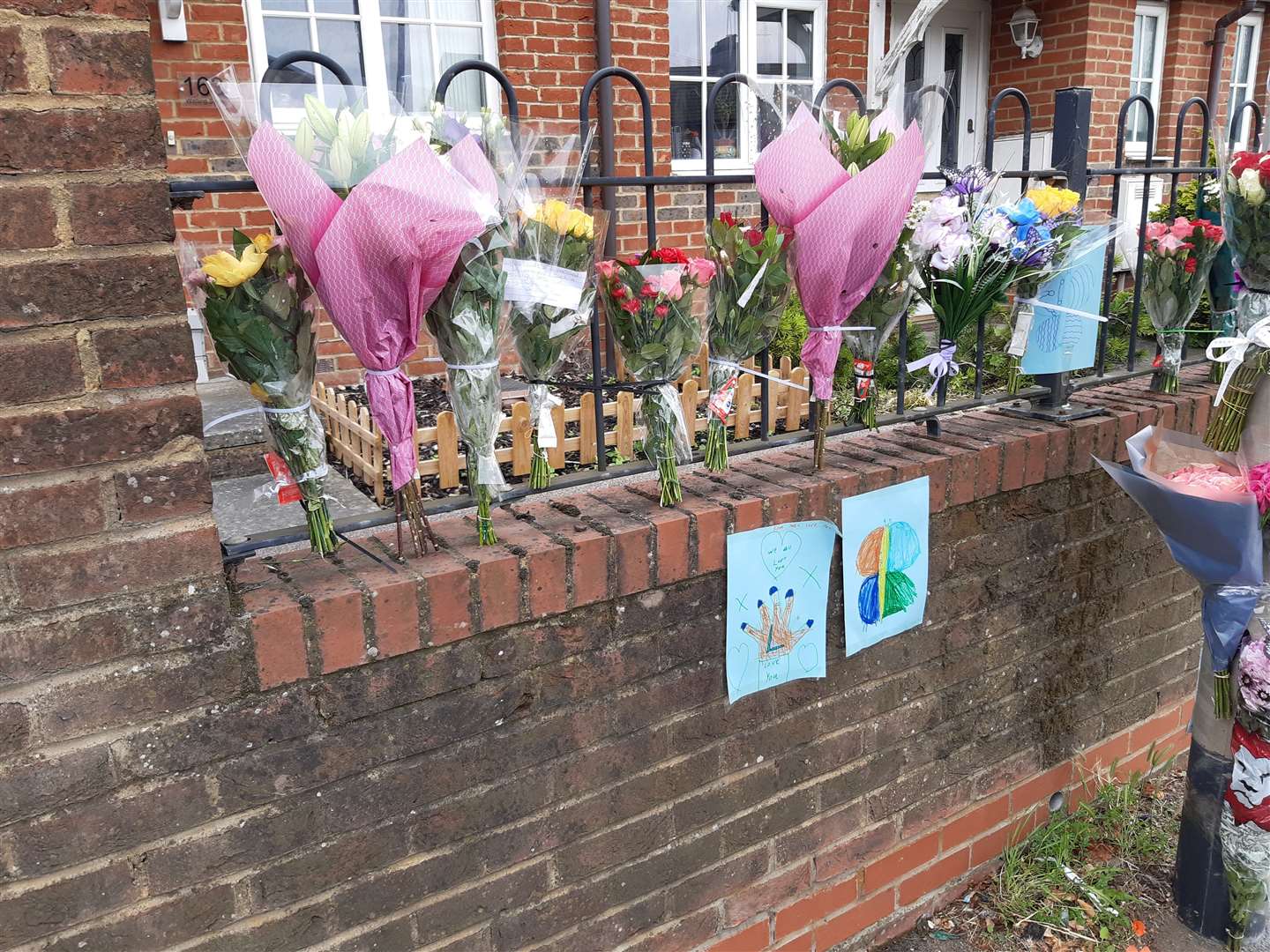 Local people gathered in Watling Street, Dartford, following the crash