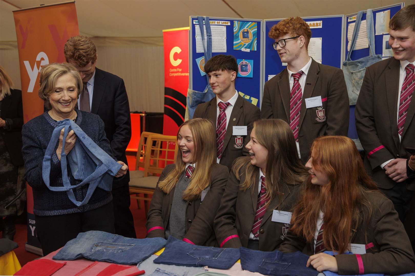 Hillary Clinton, left, met students from the Royal School Dungannon during her visit to Northern Ireland (Liam McBurney/PA)