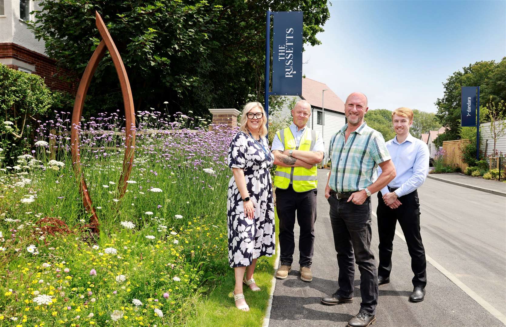 Amy Wells, Robert Reardon and Joe Stockton, from Dandara, together with sculptor Simon Probyn (second from right) at The Russetts in Hawkhurst