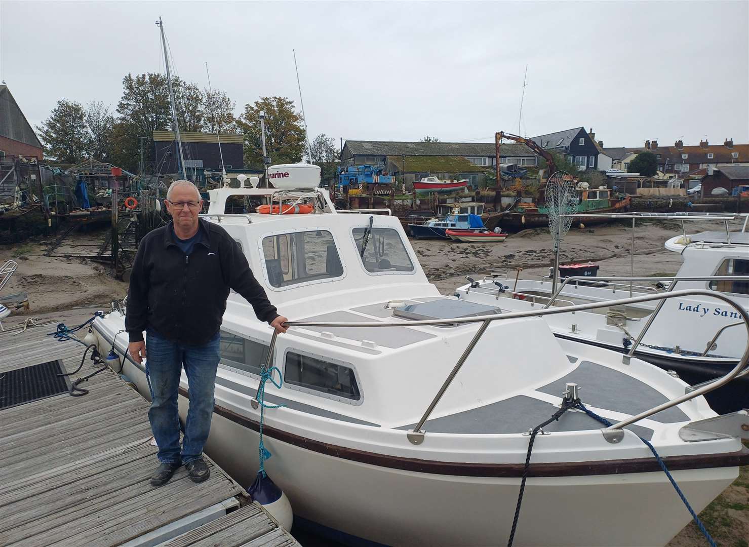 Mick King runs a tackle supply shop but also moors his recently refurbished boat at the site