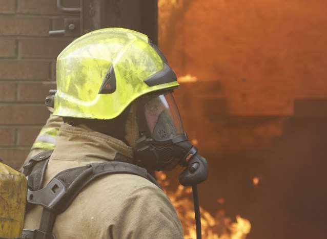 Firefighters wearing breathing apparatus tackled the blaze. Stock picture