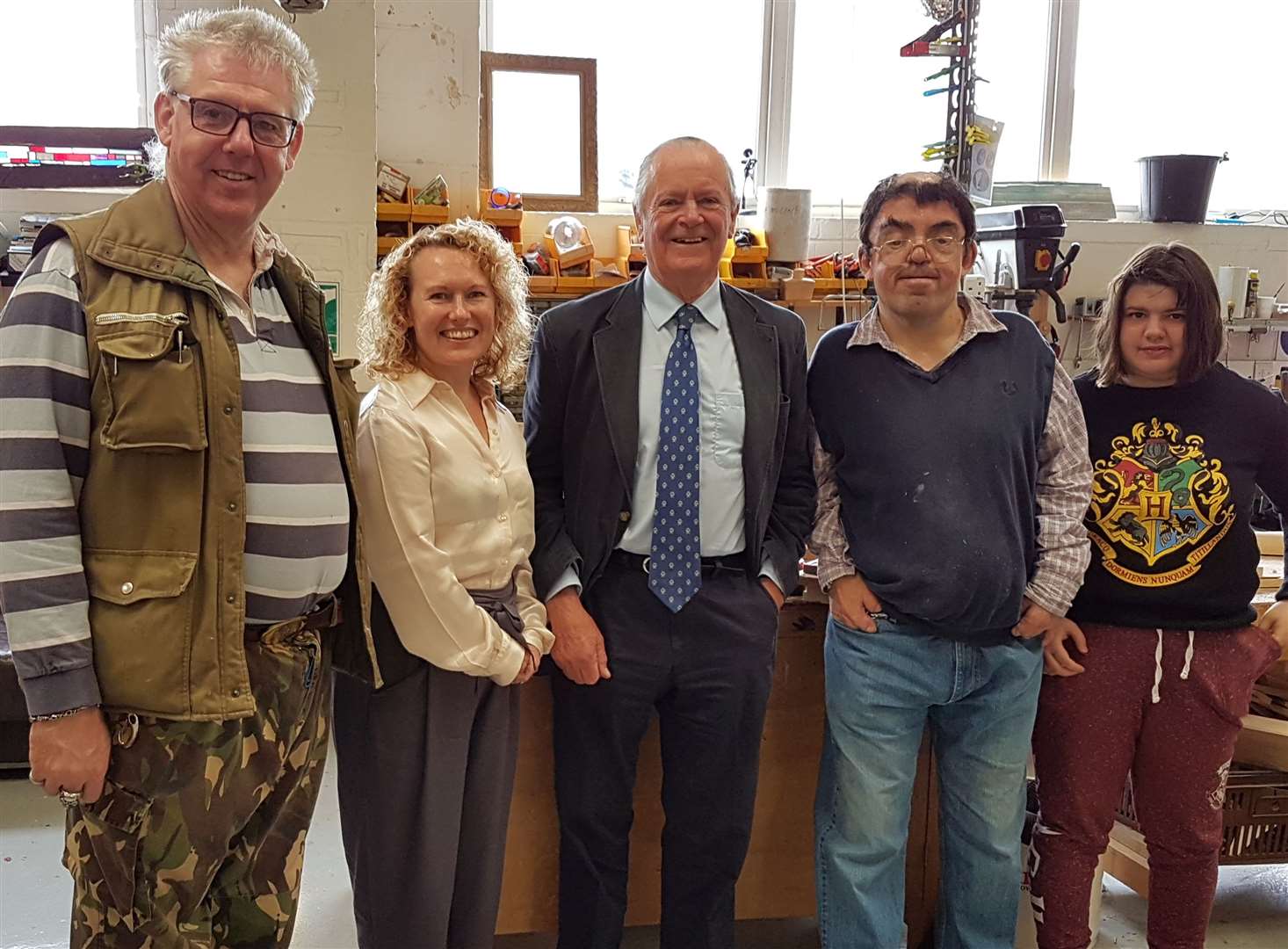 Josephine McCartney visiting a charity teaching woodworking skills to vulnerable members of the community