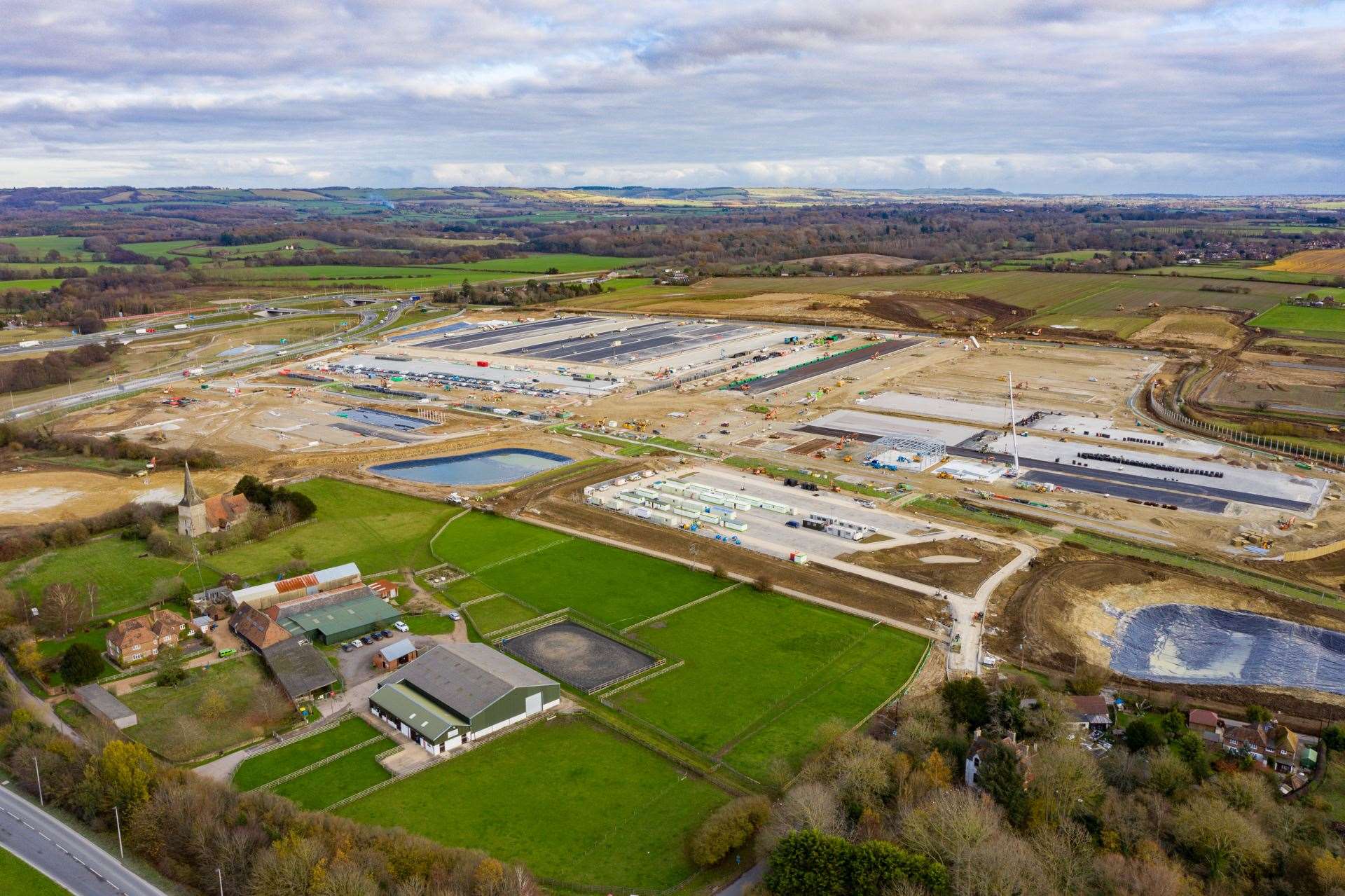 The lorry park is close to the M20, the A2070 and Church Road