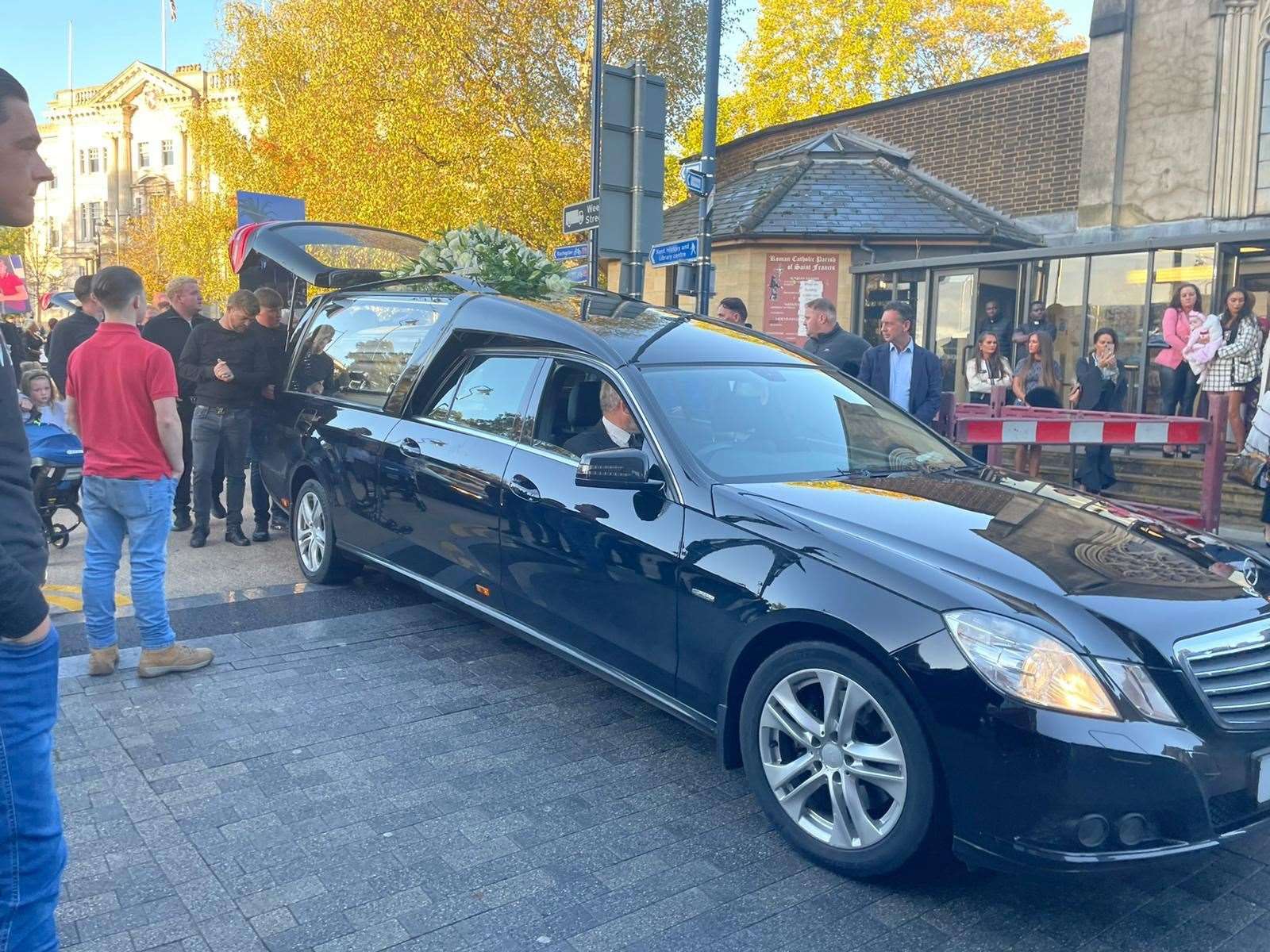 Mourners outside St Francis Church, in Maidstone, where a mass is being held after four men died in a horror crash on Sunday, October 10 (52623109)