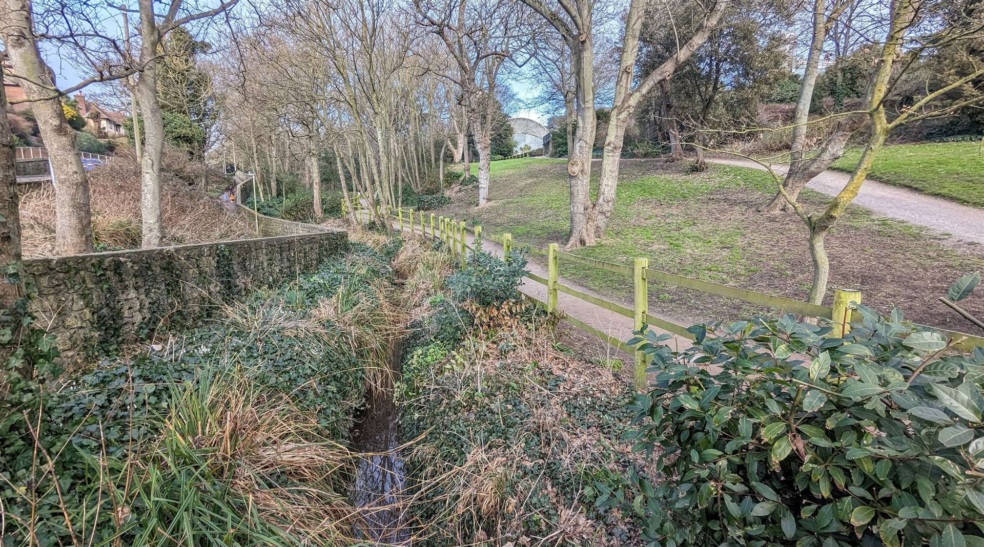 A stream runs through Enbrook Park