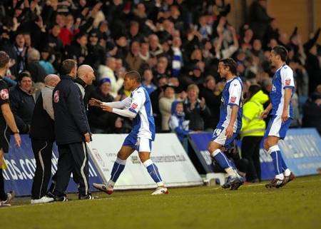 Goal scorer Simeon Jackson celebrates with the bench.