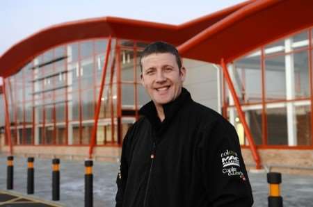 David Fowle outside the new B&Q store at Whitfield