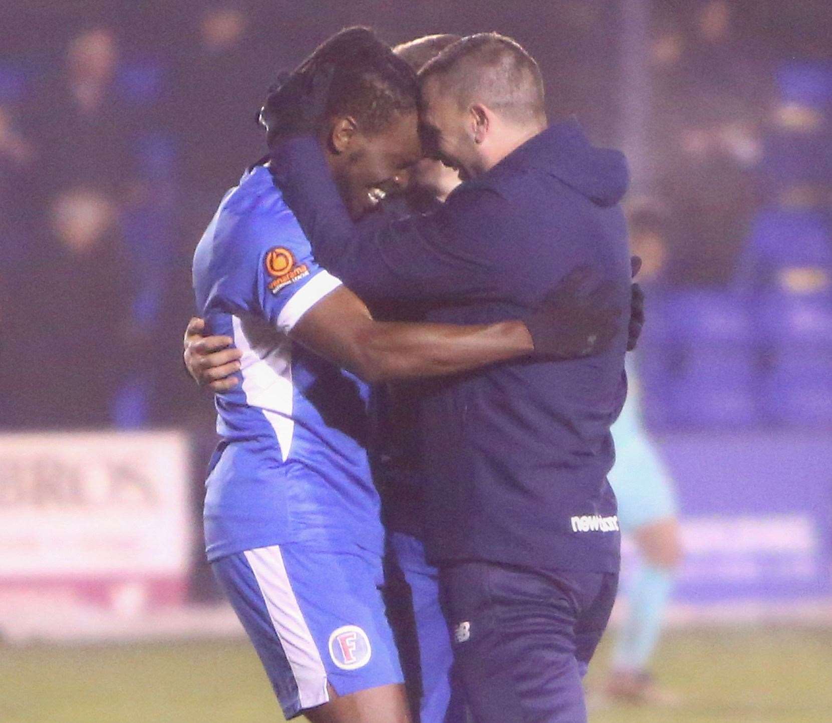 Tonbridge boss Steve McKimm embraces matchwinner Ibrahim Olutade after the 2-1 FA Trophy win over Torquay. Picture: Dave Couldridge