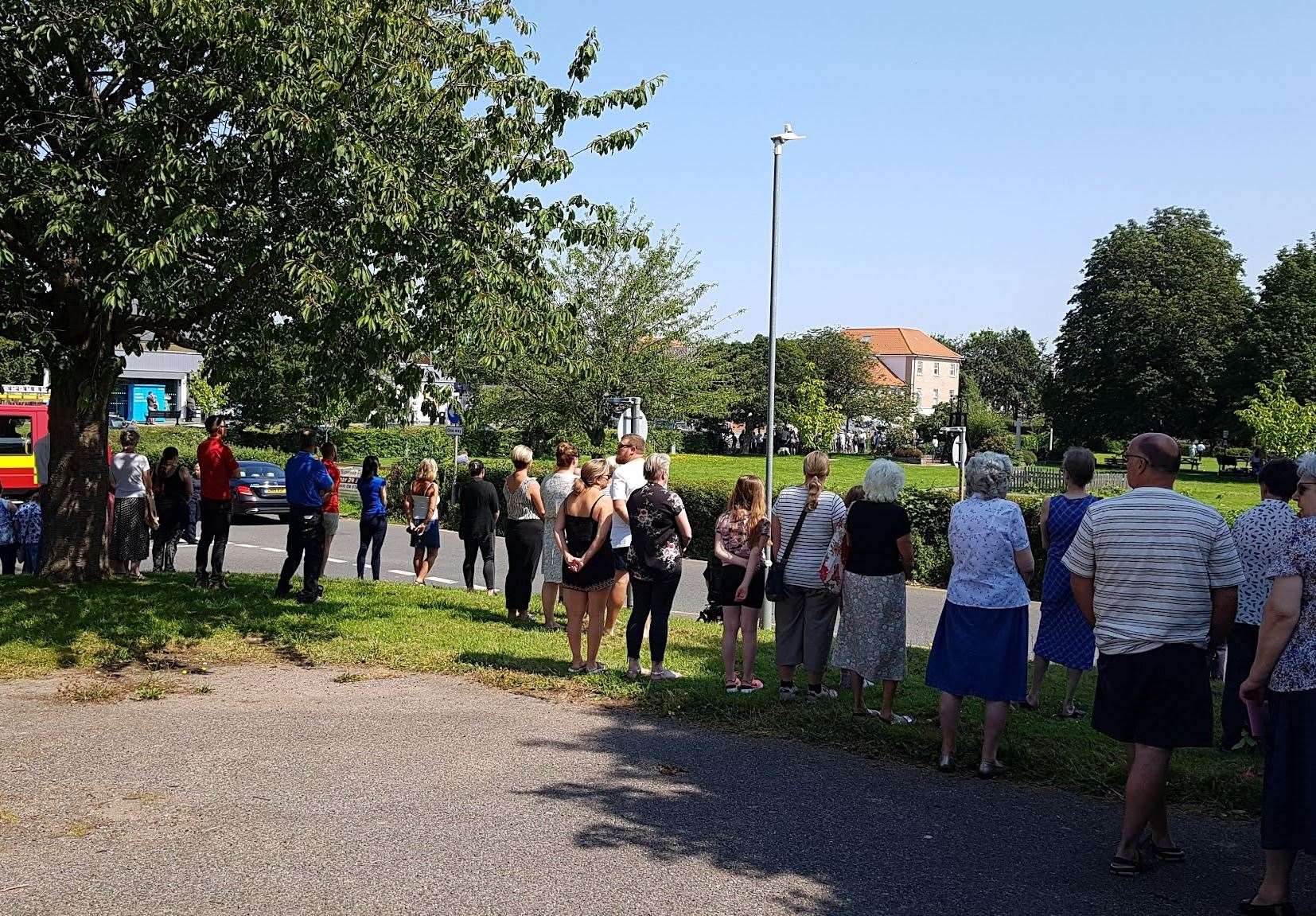 Crowds lined the streets in Aylesham to pay their respects as Julia James' funeral cortege passed by