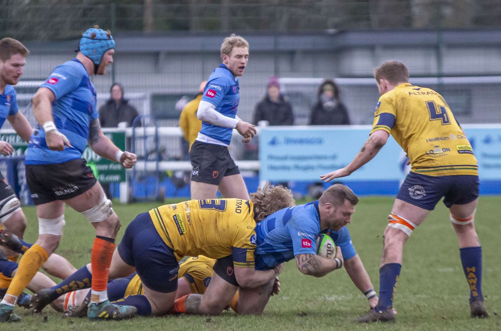 Canterbury's Aaron Cooper is tackled by Henley. Picture: Phillipa Hilton