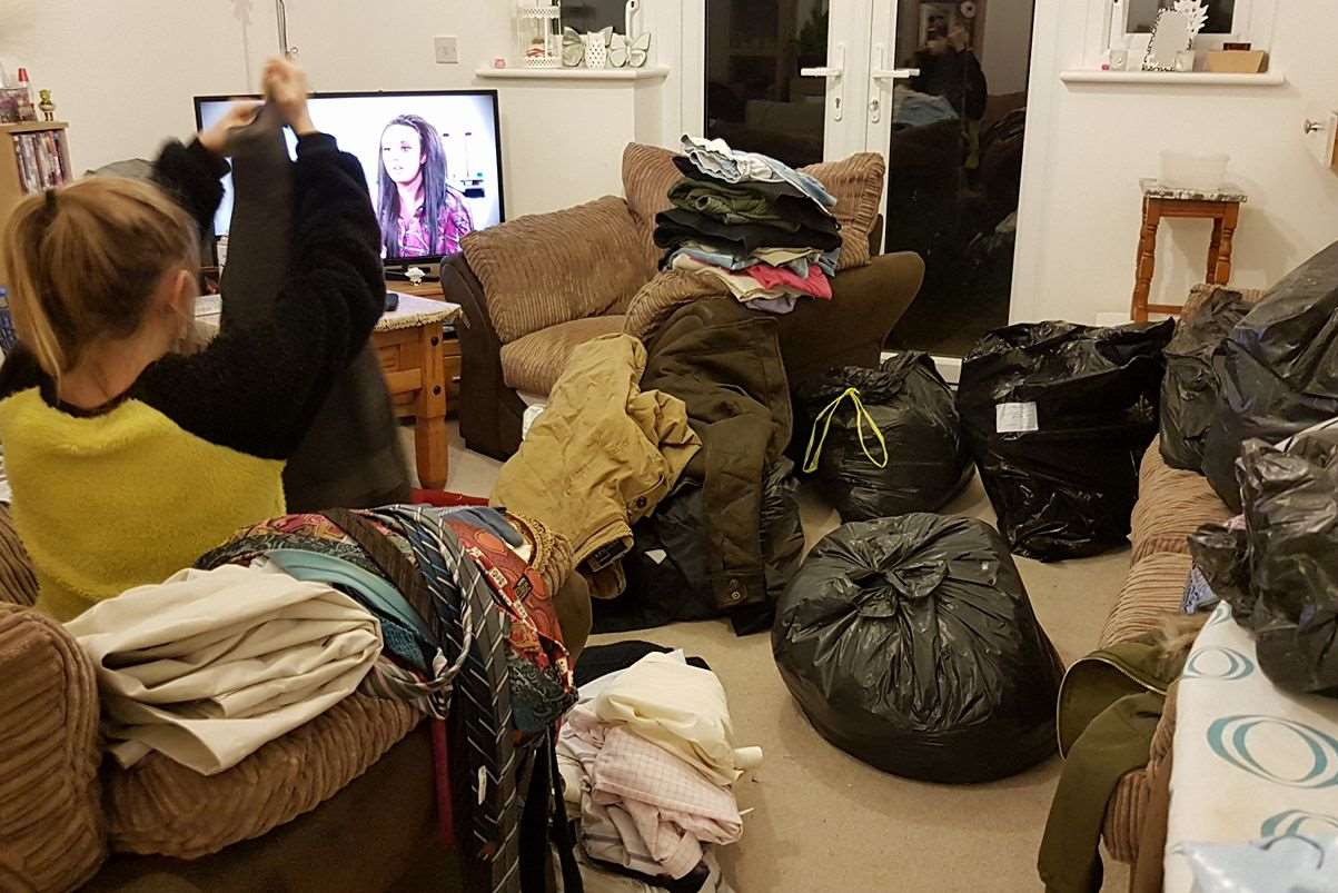 A volunteer goes through some of the donations received