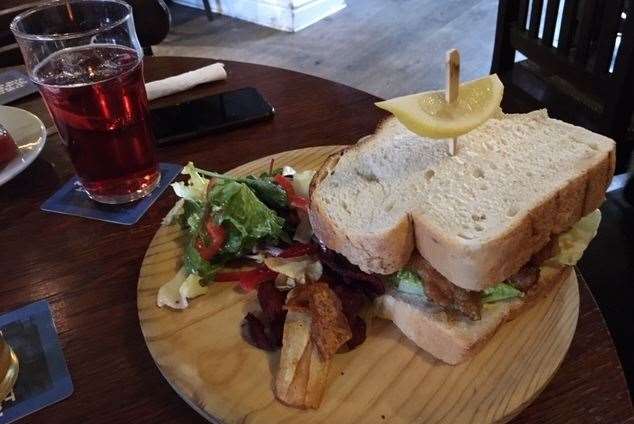 At the Woolpack, Chilham the fish finger sandwich was well presented on a trendy wooden board but it didn’t come cheap