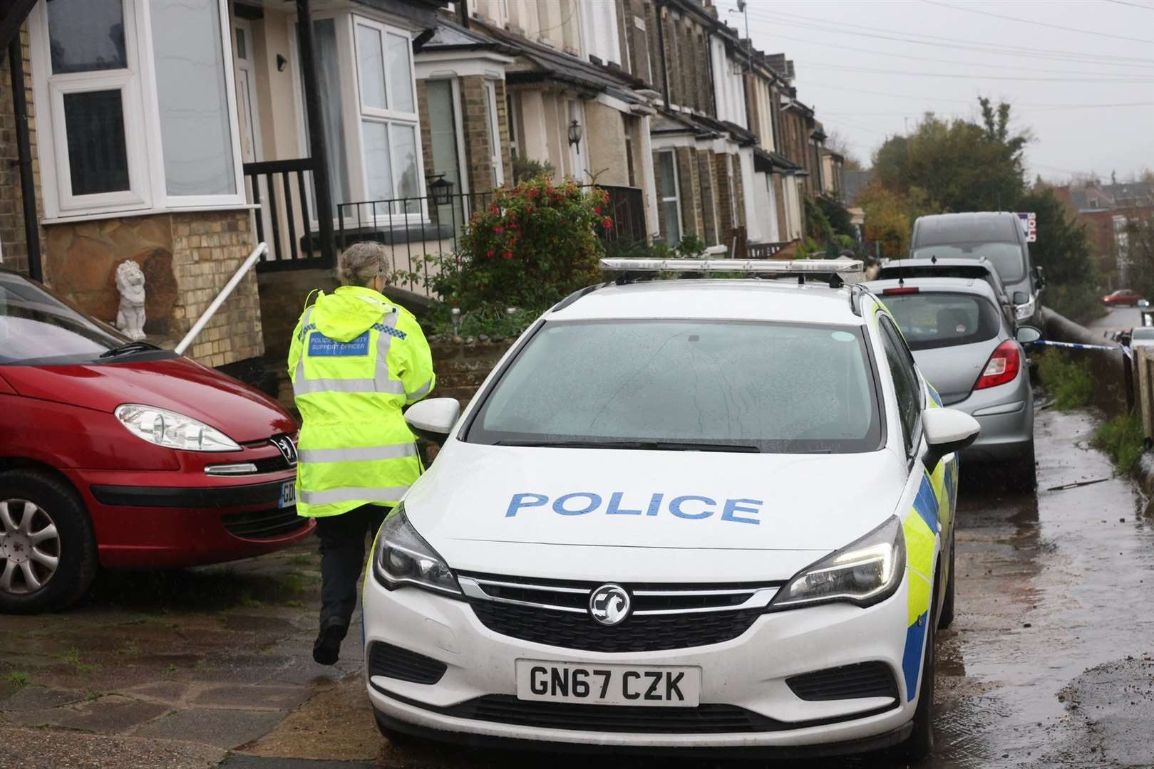 Police in Borstal Street yesterday. Picture: UKNIP