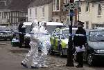 Police outside the couple's home