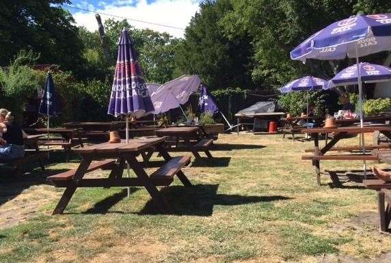 A few of the umbrellas had taken a tumble and it was certainly warm in the garden but most folks were not put off and still chose to sit outside