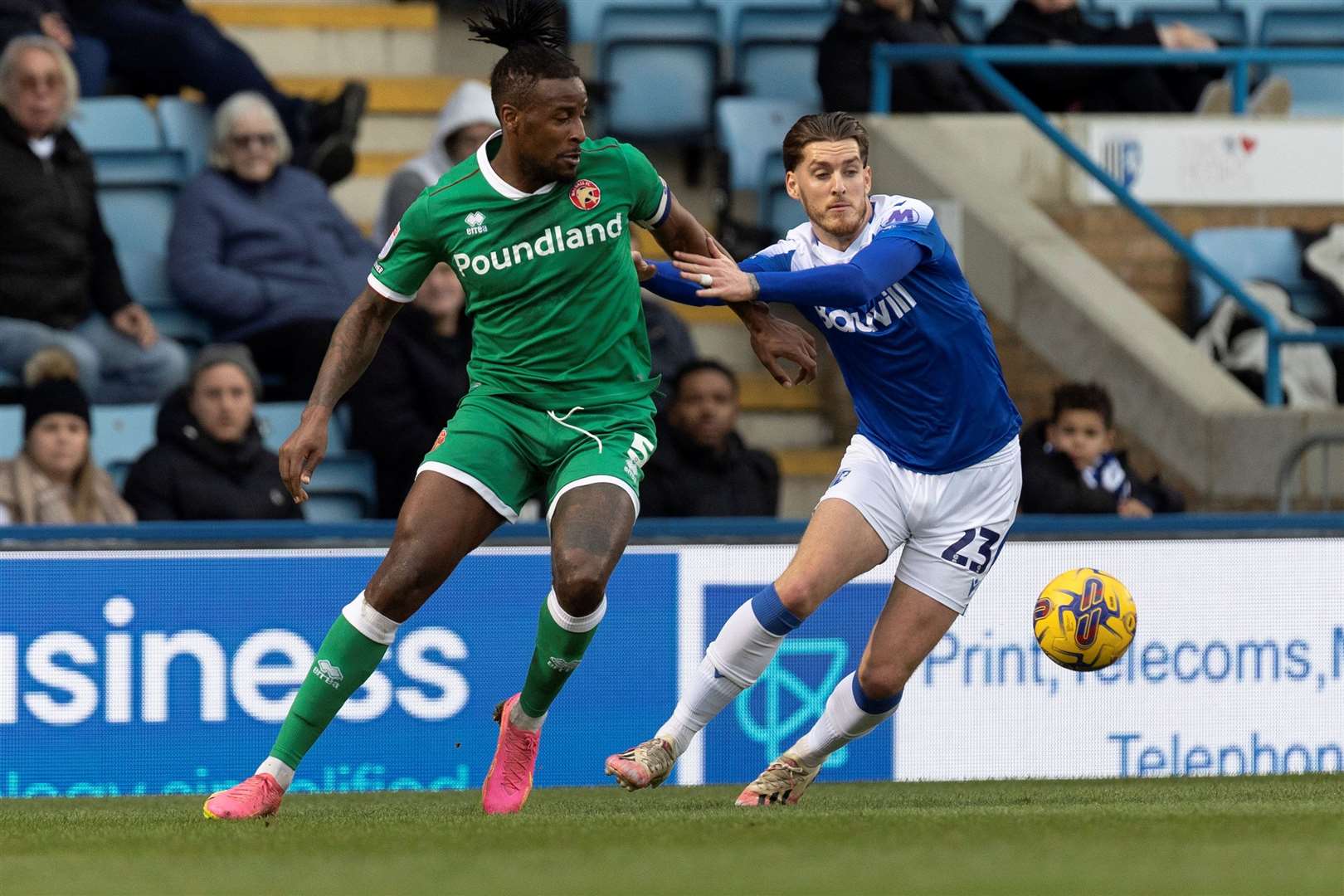 Gillingham’s Connor Mahoney gets to grips with Walsall’s Donervon Daniels last Saturday Picture: @Julian_KPI