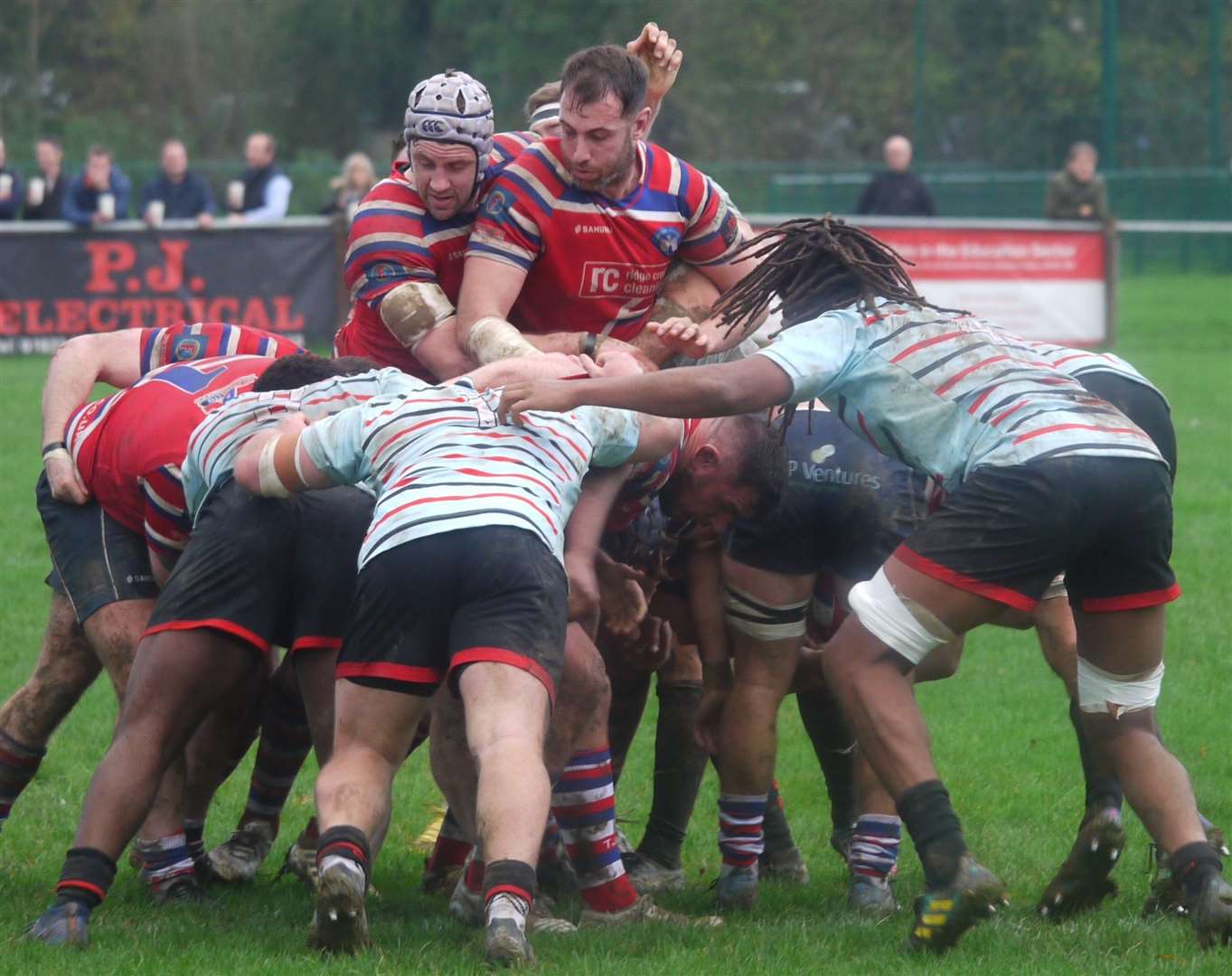 Tonbridge Juddians' Toby Freeman and Perry Parker try to halt a Blackheath drive. Picture: Adam Hookway