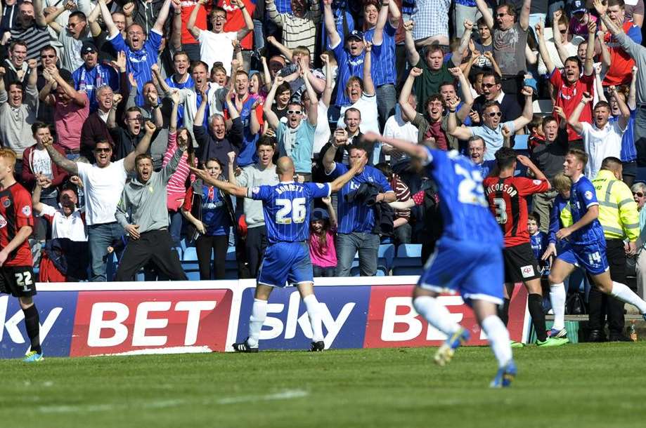 Captain Adam Barrett celebrates his goal against Shrewsbury. Picture: Barry Goodwin