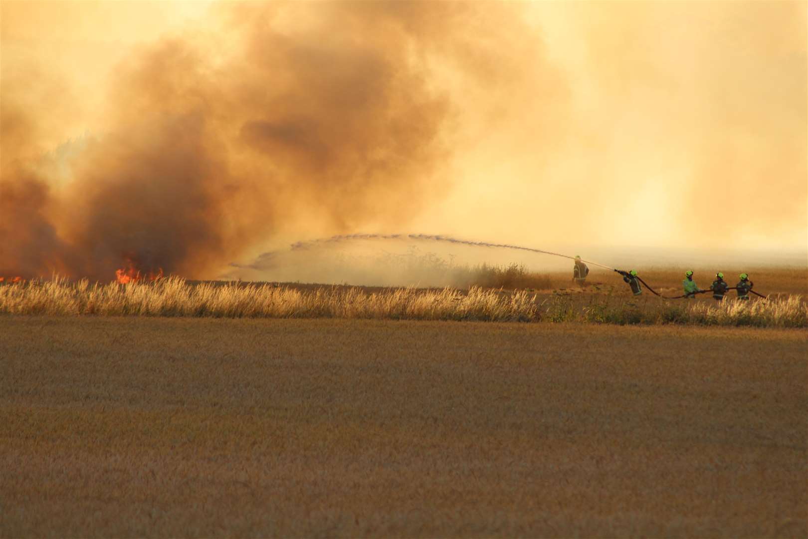 Firefighters tackle the blaze. Picture: Emma Campbell