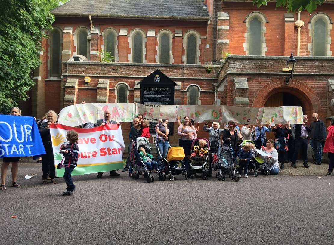 Protesters demonstrating outside the St George's Centre